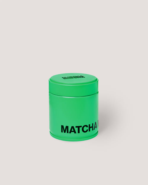 Front view of Matcha Matcha Can, bright green tin with black logo, ceremonial grade Uji matcha powder.