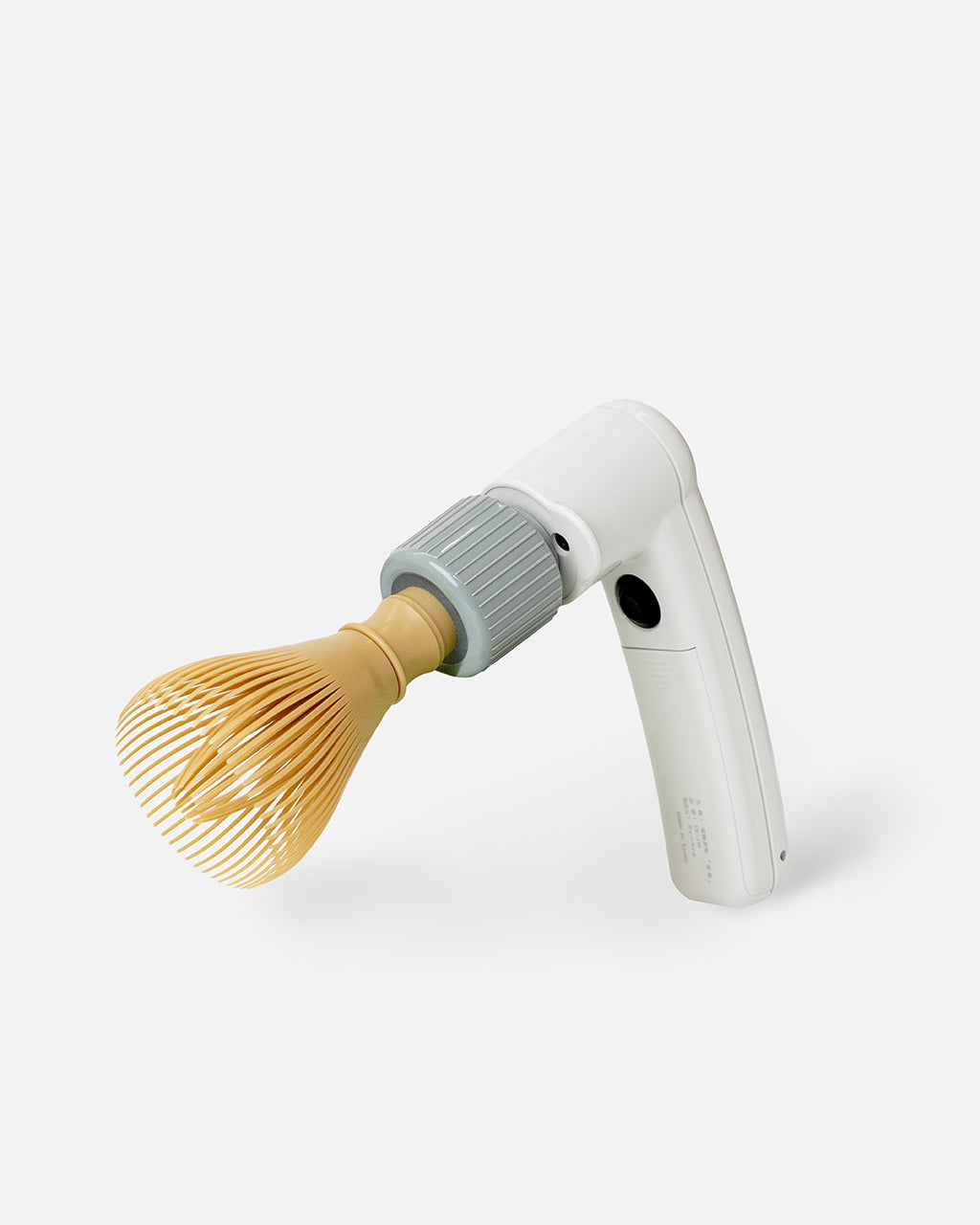 Electric Matcha Whisk Gun with Resin Matcha Whisk attachment, modern tool for lattes and tea rituals.