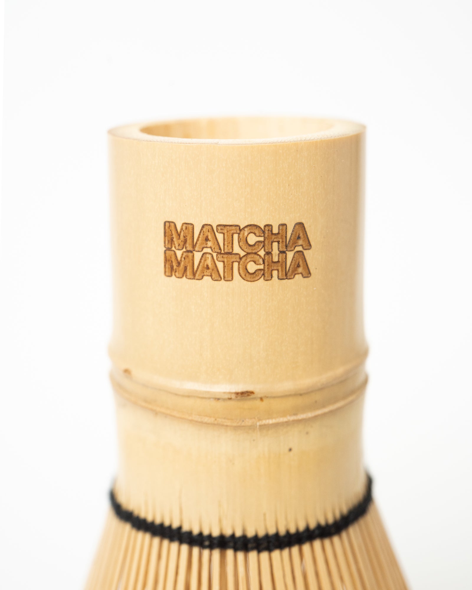 Bamboo whisk with 'Matcha Matcha' branding
