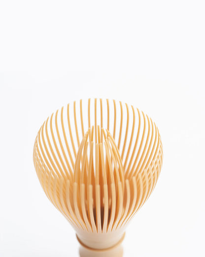 Close-up of resin matcha whisk head, 55-tine chasen designed for smooth froth in matcha tea and lattes.